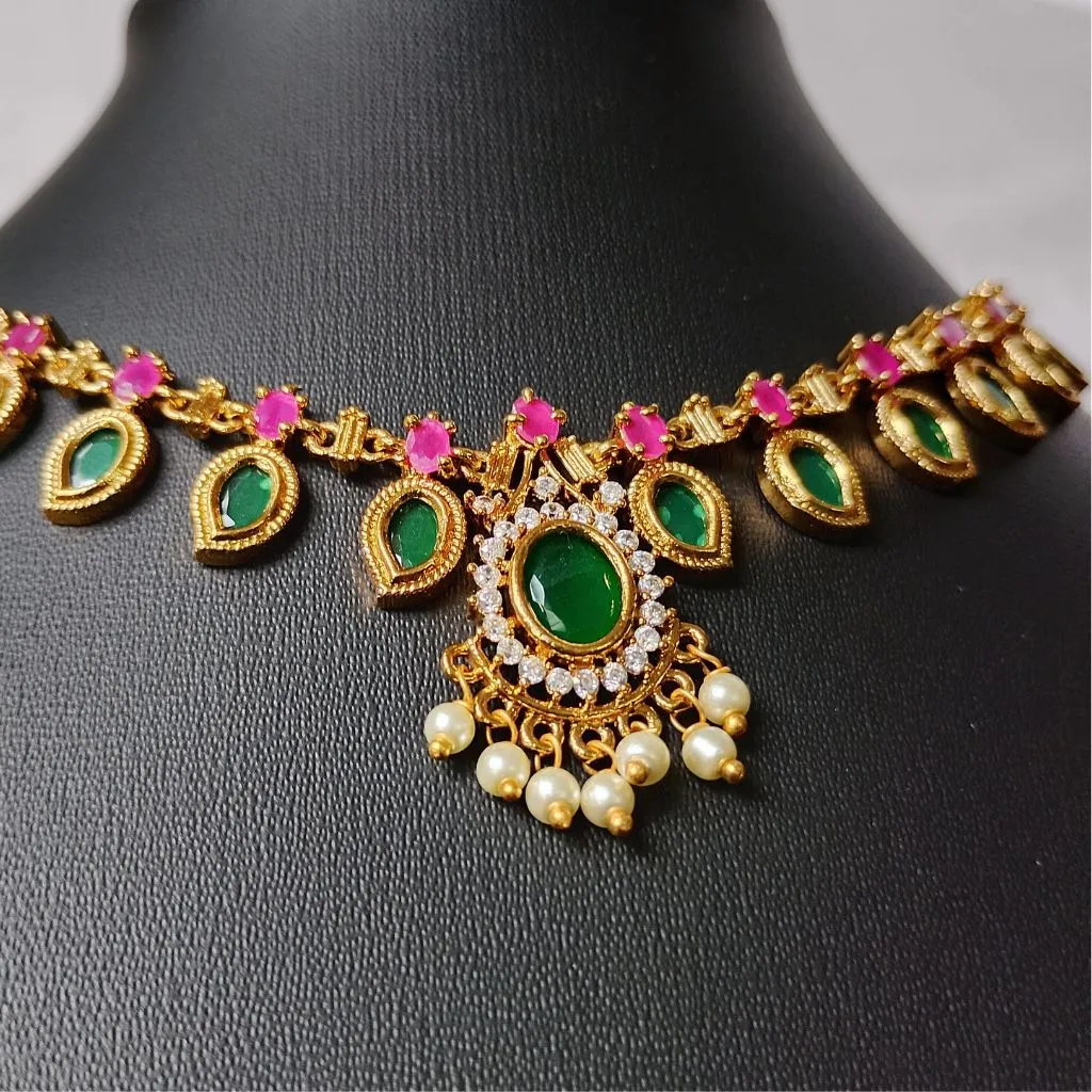 Traditional Kerala Palakka Mala necklace with green stone leaves and ruby red accent stones